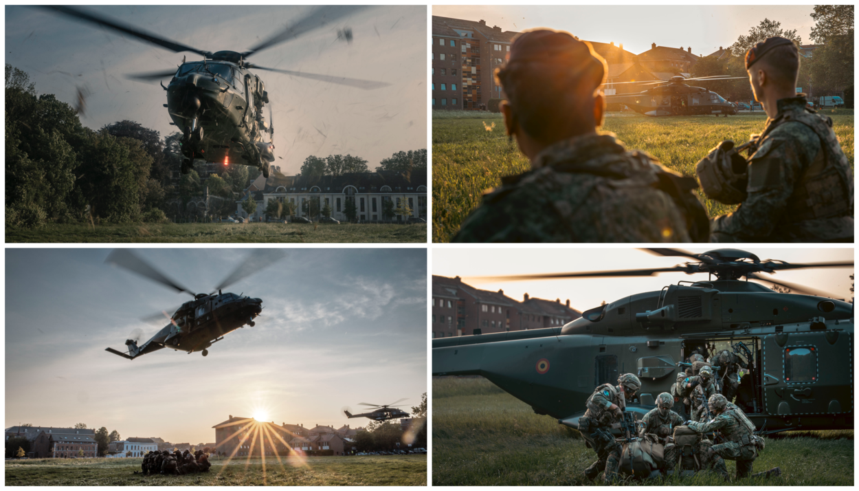 Helikopters landen op een grasveld terwijl de zon ondergaat.