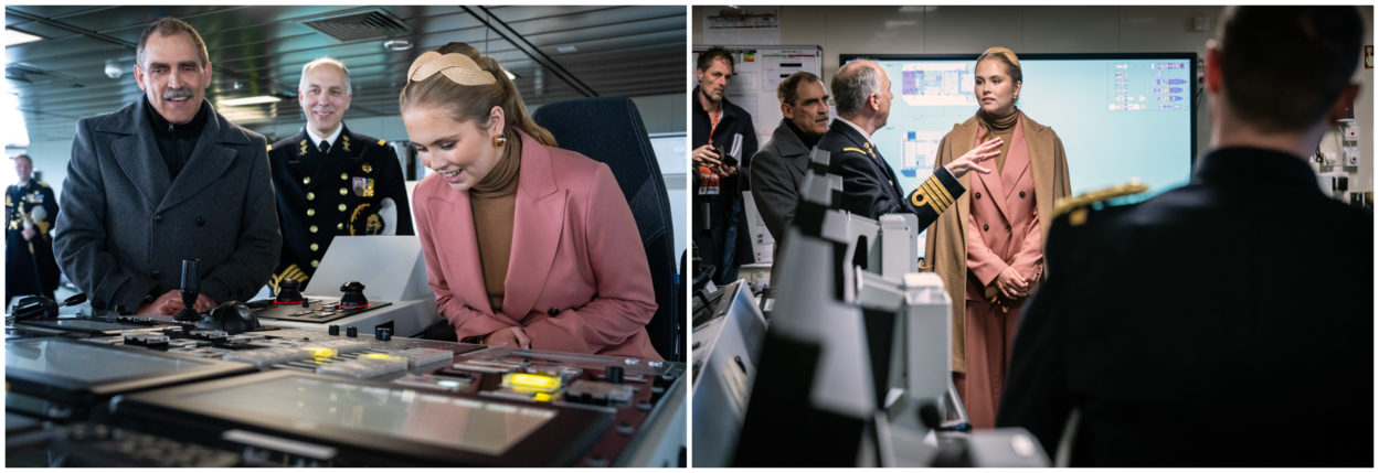 Prinses Amalia zit op de brug op de roergangerpositie terwijl ze met bemanningsleden spreekt.