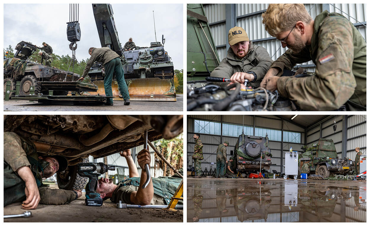 Militairen van het herstelpeloton sleutelen aan de voertuigen.