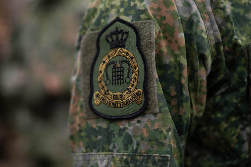 Logo GLR op mouw gevechtstenue.